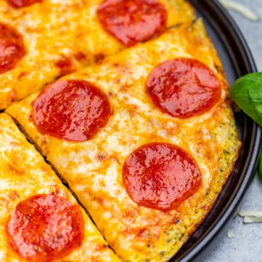 Close up view of cauliflower pizza crust pizza.